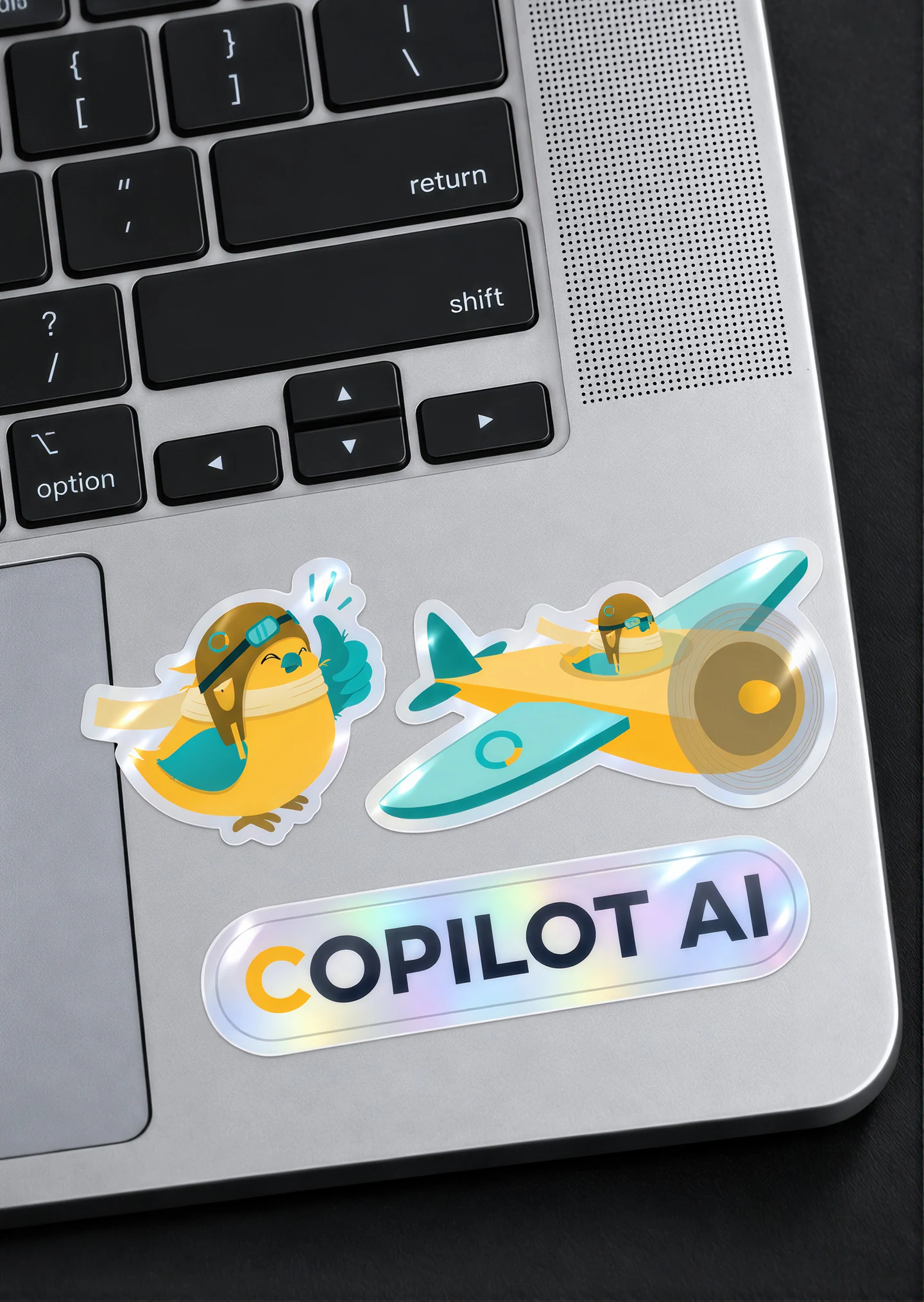 CoPilot AI stickers on a laptop